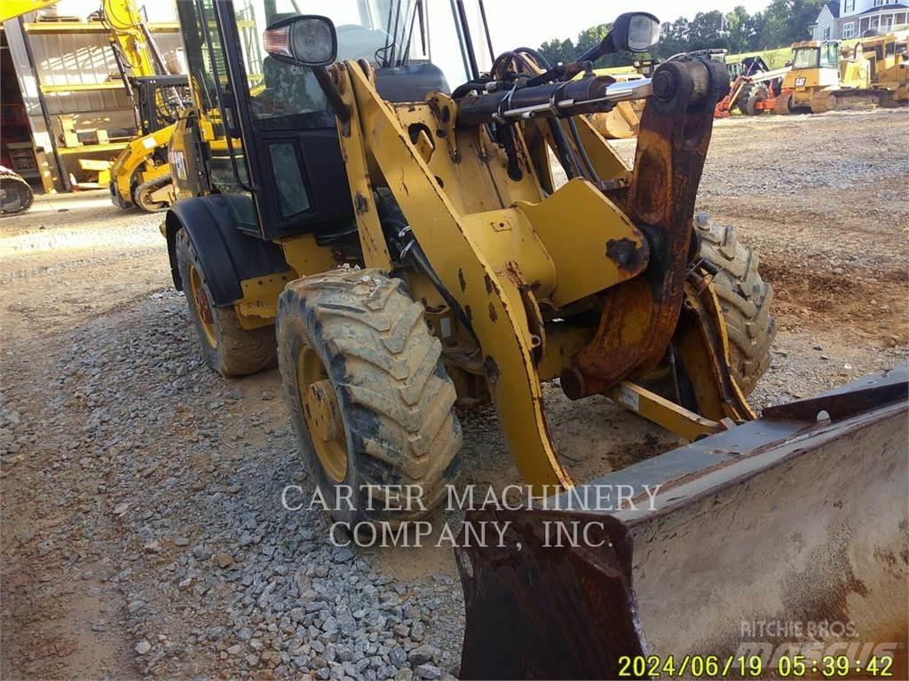 CAT 906M Фронтальні навантажувачі
