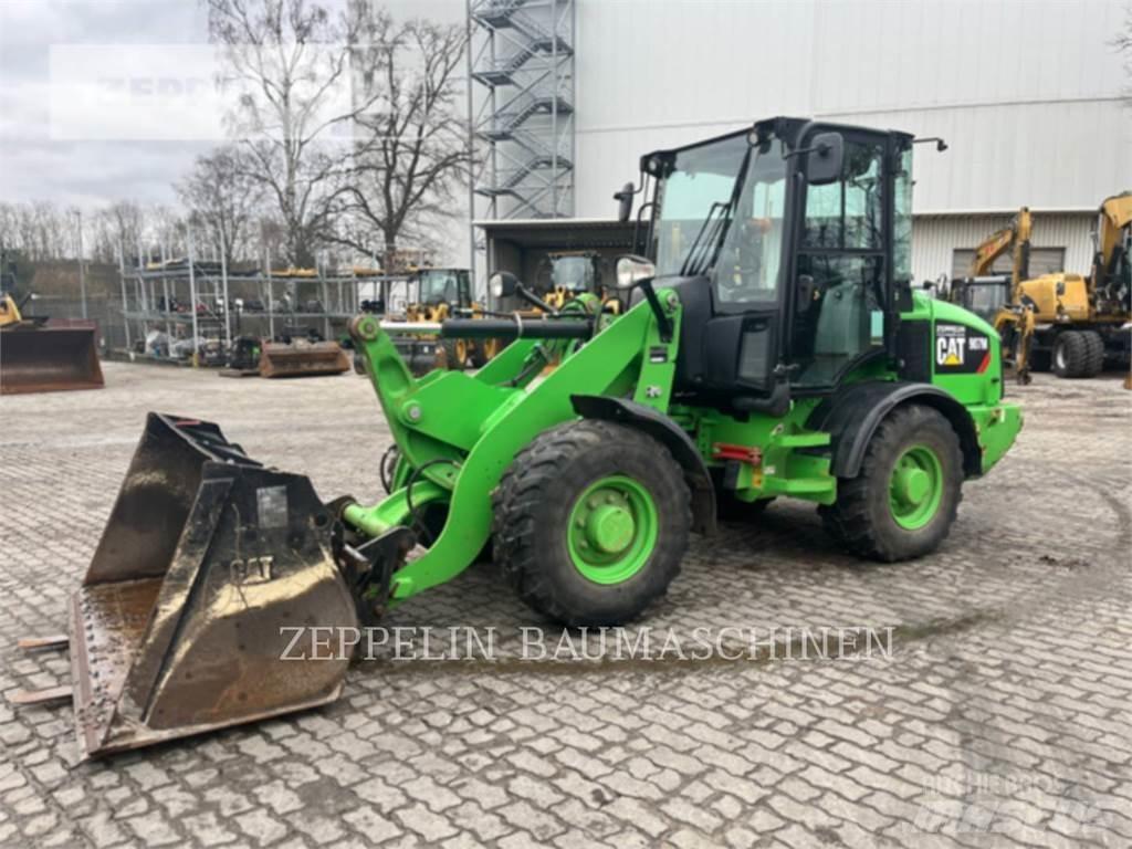CAT 907M Фронтальні навантажувачі