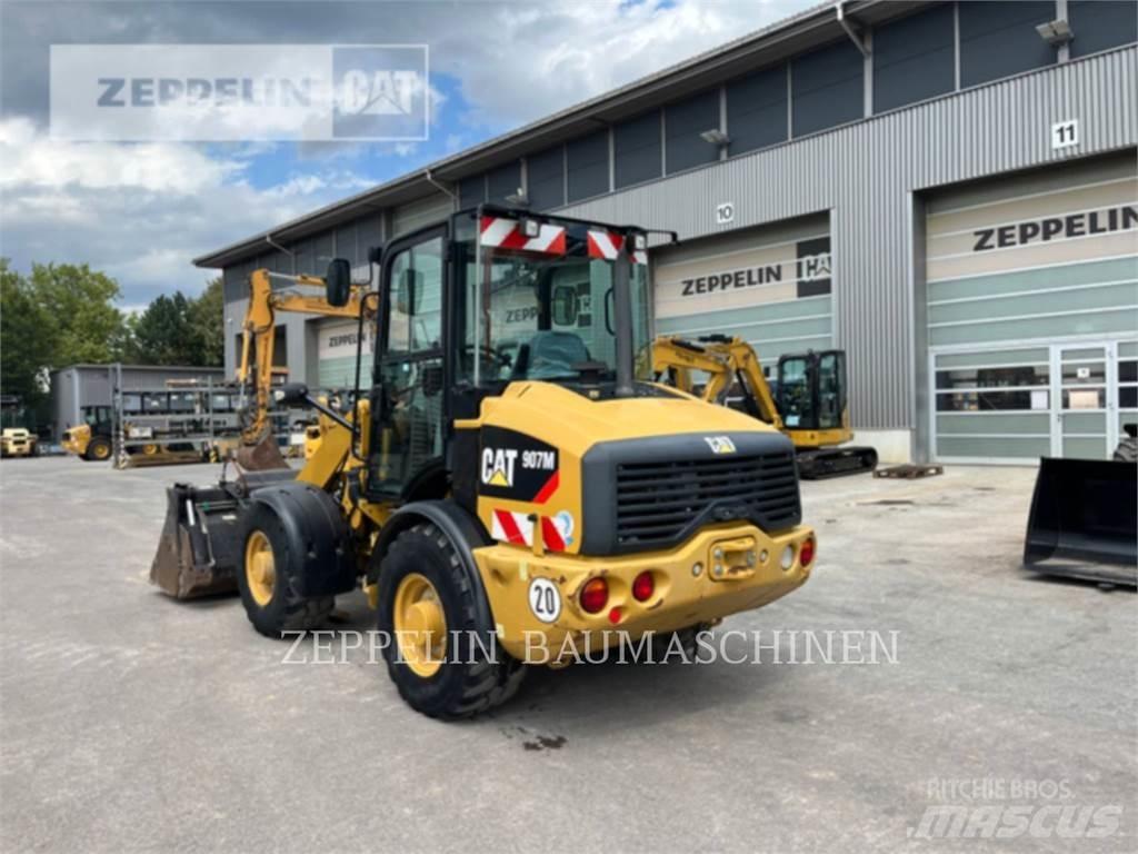 CAT 907M Фронтальні навантажувачі