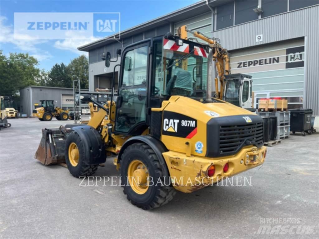 CAT 907M Фронтальні навантажувачі