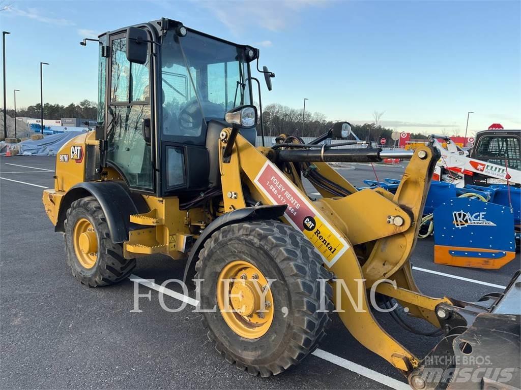 CAT 907M Фронтальні навантажувачі