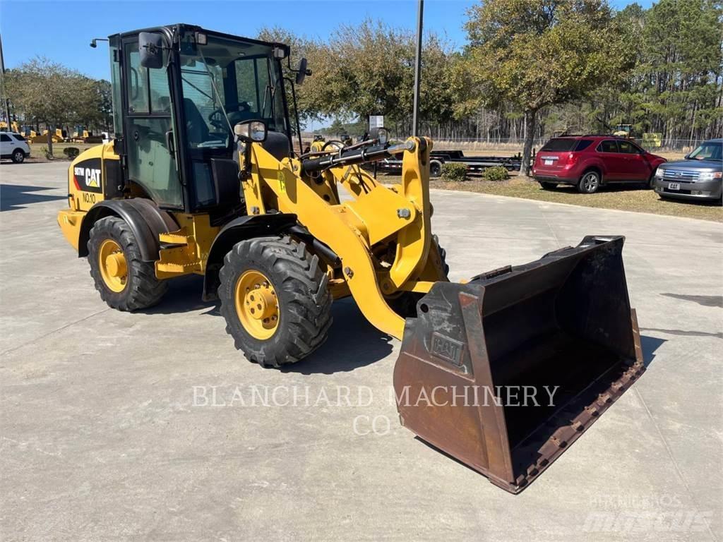 CAT 907M Фронтальні навантажувачі