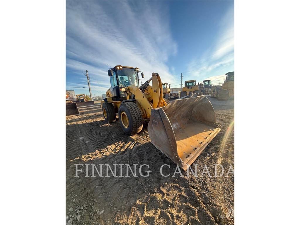 CAT 938K Колісні бульдозери