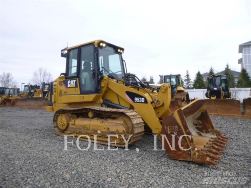 CAT 953D Гусеничні вантажники