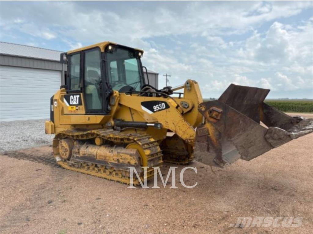 CAT 953D Гусеничні вантажники