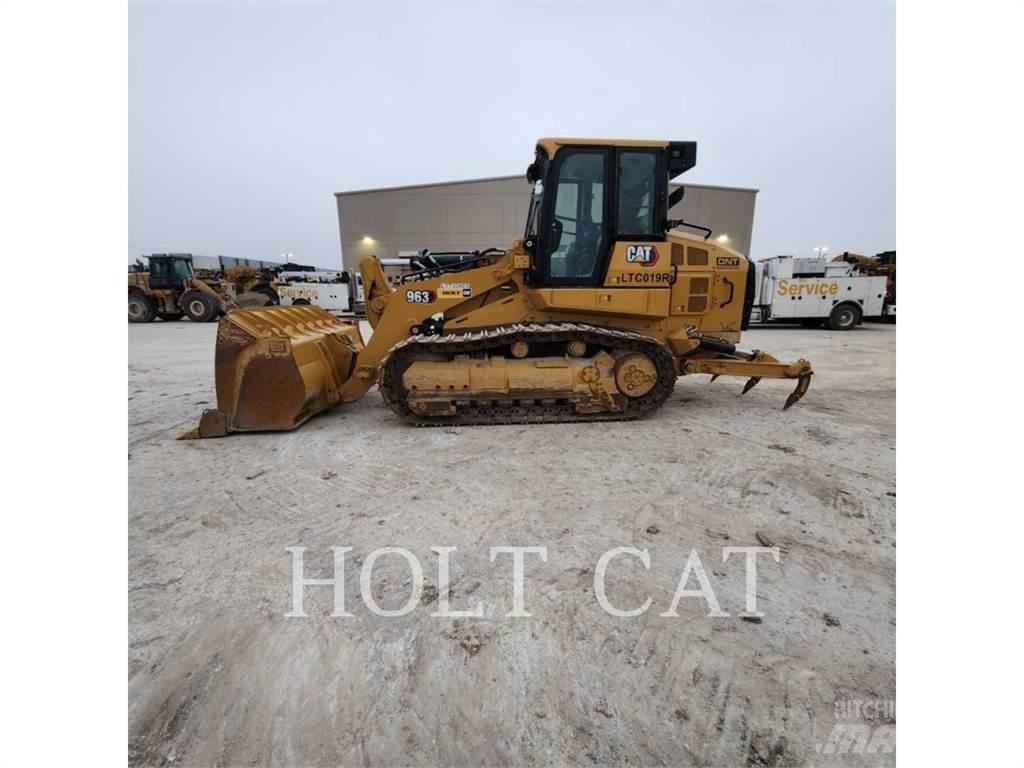 CAT 963 Гусеничні вантажники