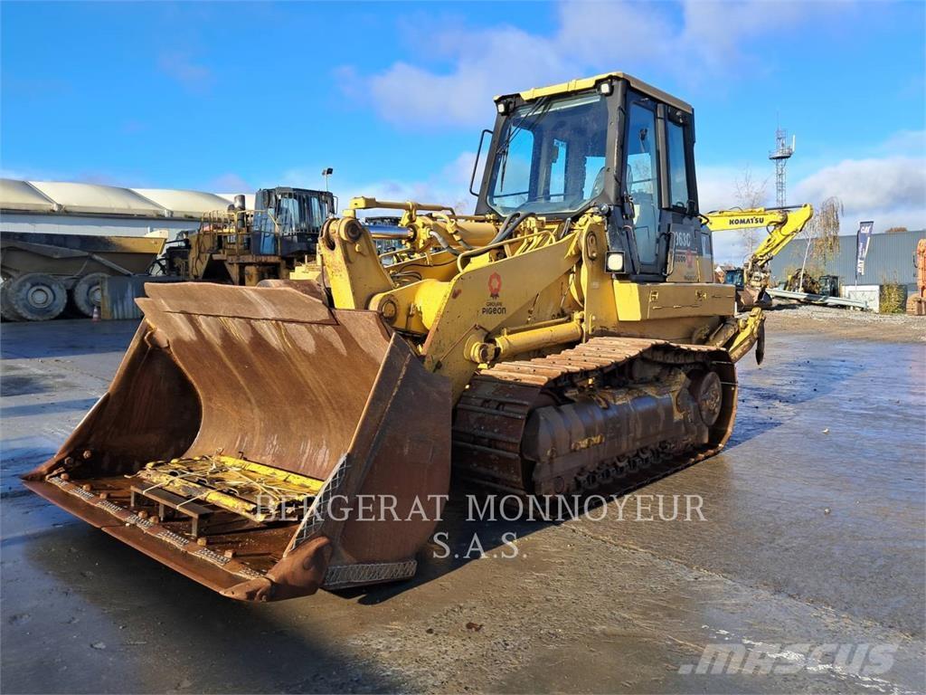 CAT 963C Гусеничні вантажники