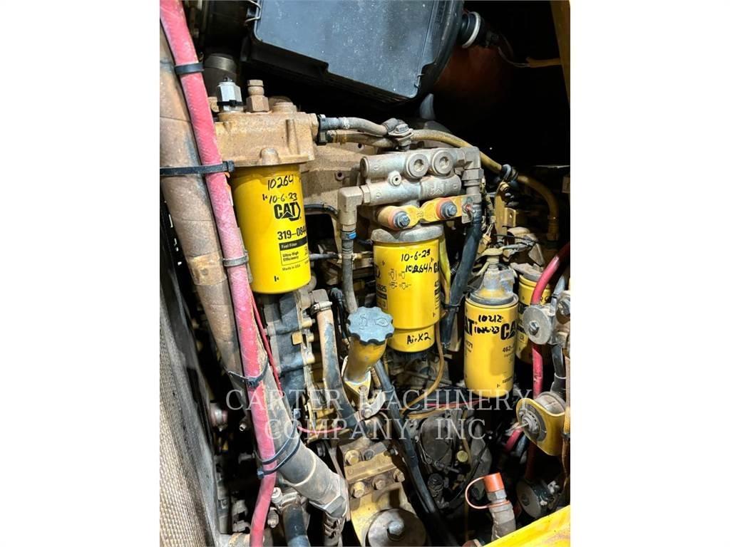 CAT 963D WASTE Гусеничні вантажники