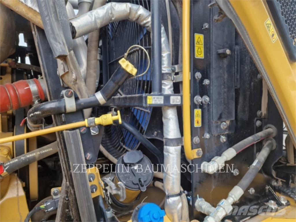 CAT 966M Фронтальні навантажувачі