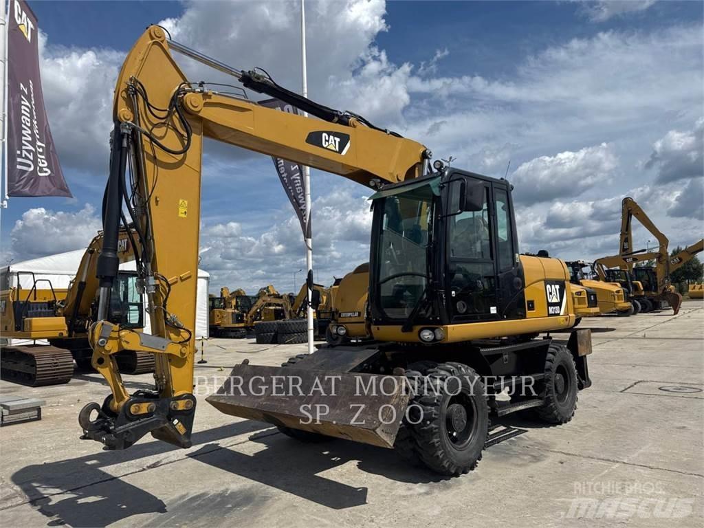 CAT M313D Колісні екскаватори