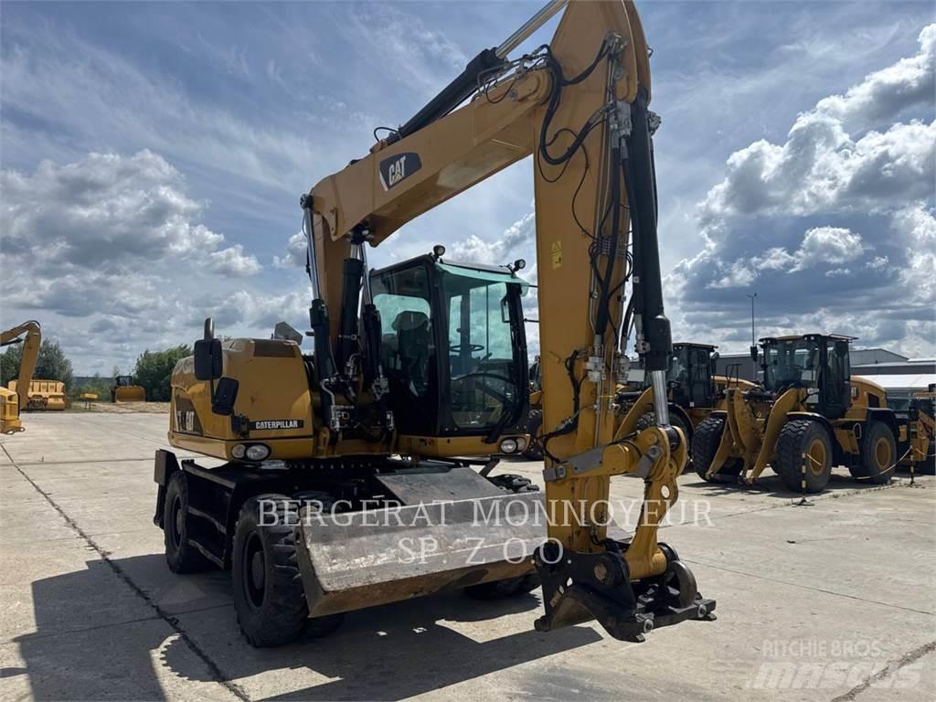 CAT M313D Колісні екскаватори
