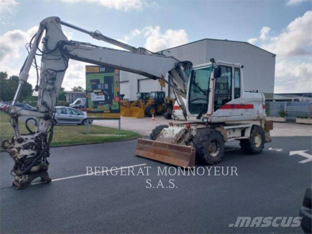 CAT M313D Колісні екскаватори