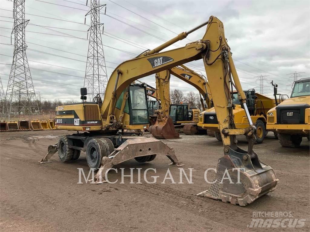 CAT M315 Колісні екскаватори