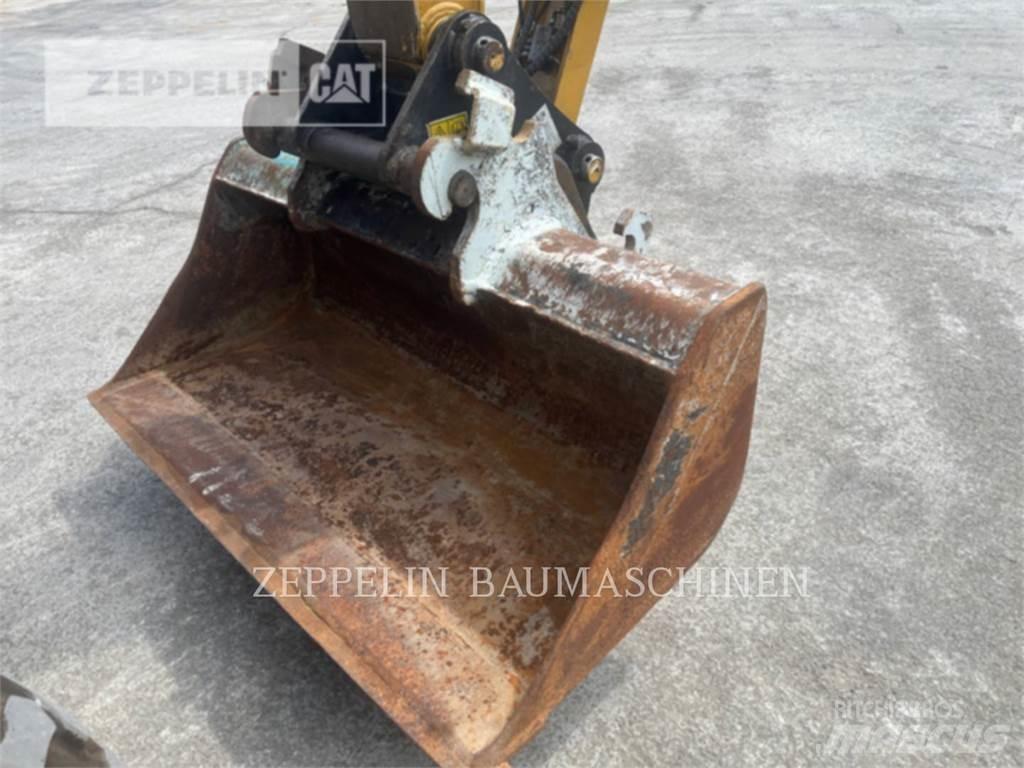 CAT M315-07A Колісні екскаватори
