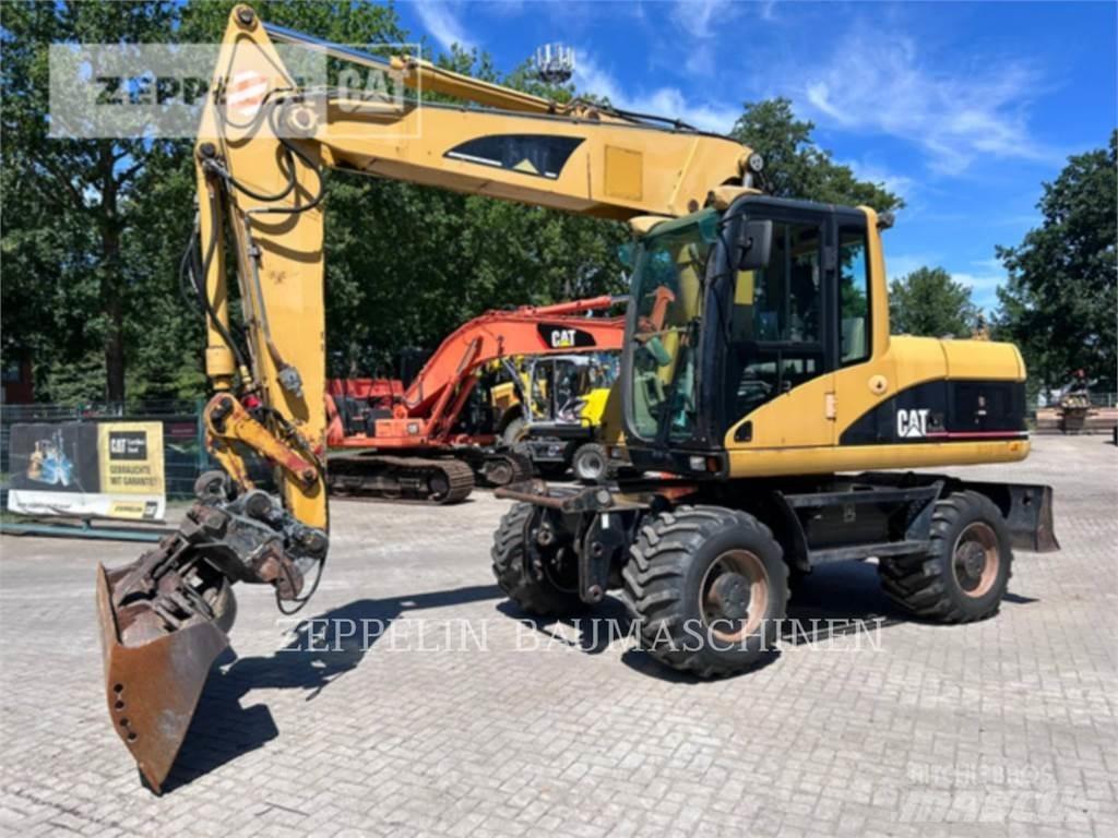 CAT M315C Колісні екскаватори