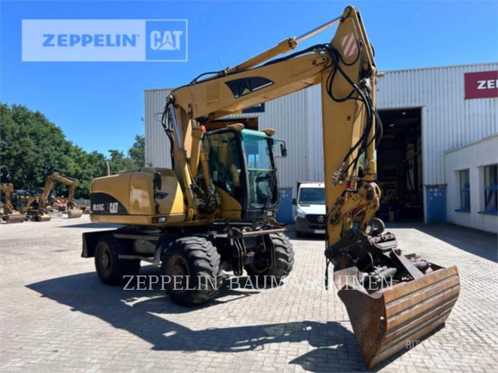 CAT M315C Колісні екскаватори