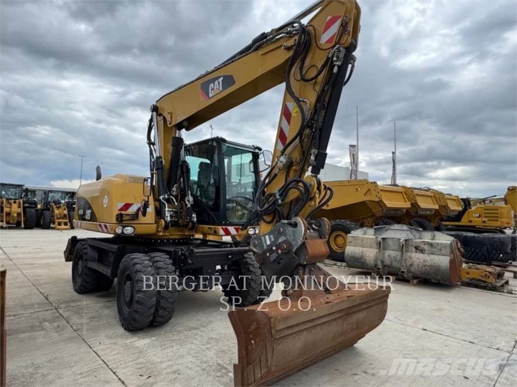 CAT M315D Колісні екскаватори