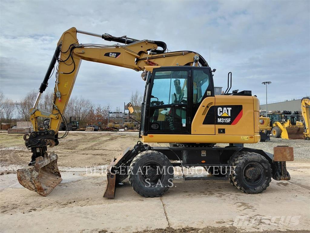 CAT M315F IVC Колісні екскаватори
