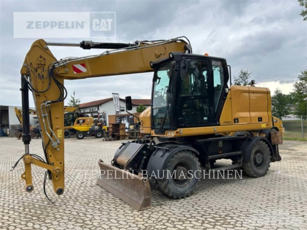 CAT M318-07A Колісні екскаватори