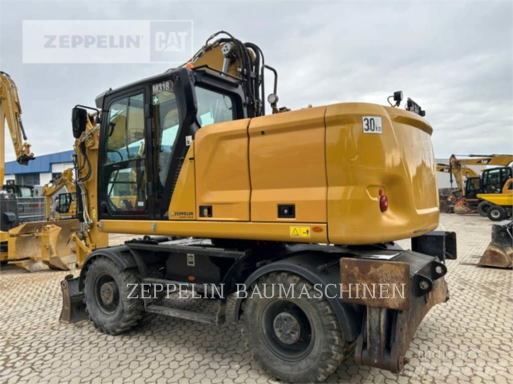 CAT M318-07A Колісні екскаватори