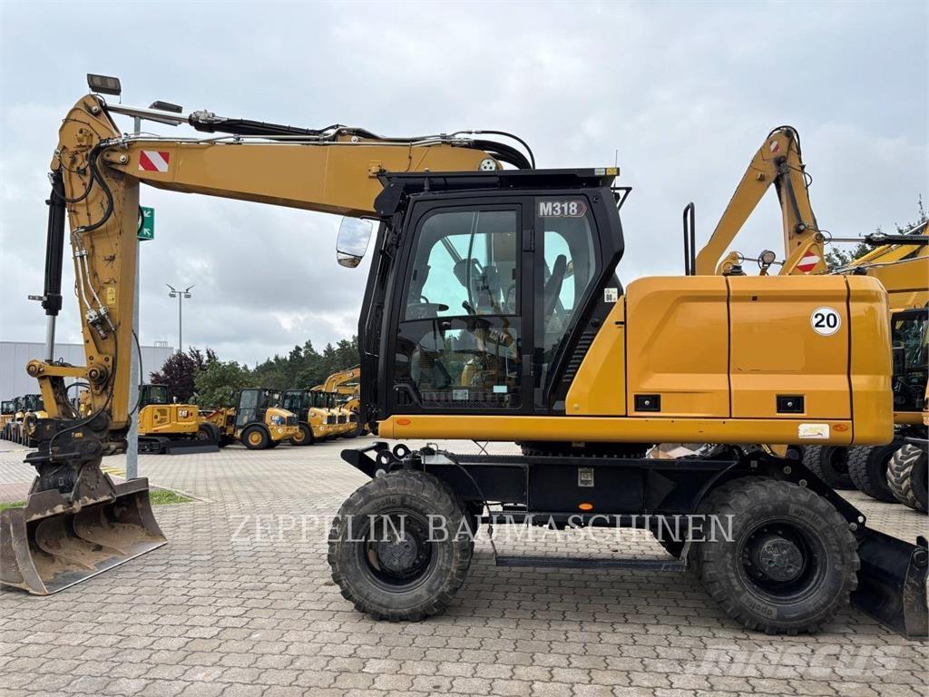 CAT M318-07A Колісні екскаватори