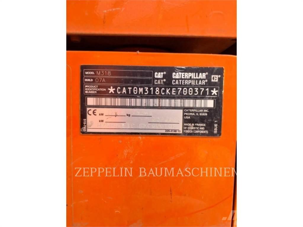 CAT M318-07A Колісні екскаватори