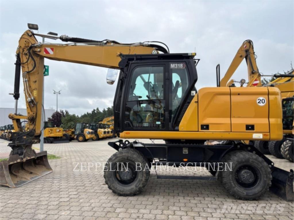 CAT M318-07A Колісні екскаватори