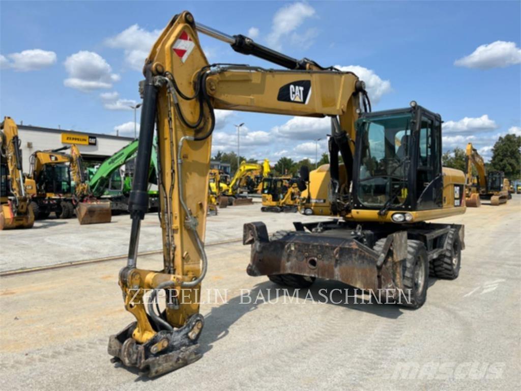 CAT M318D Колісні екскаватори
