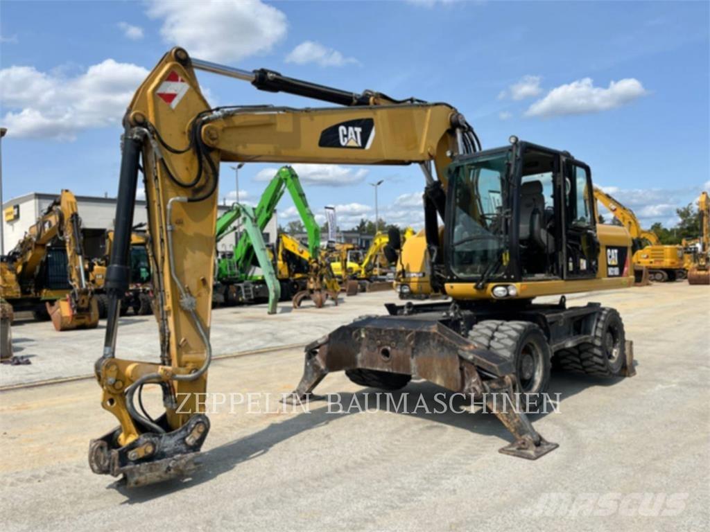 CAT M318D Колісні екскаватори