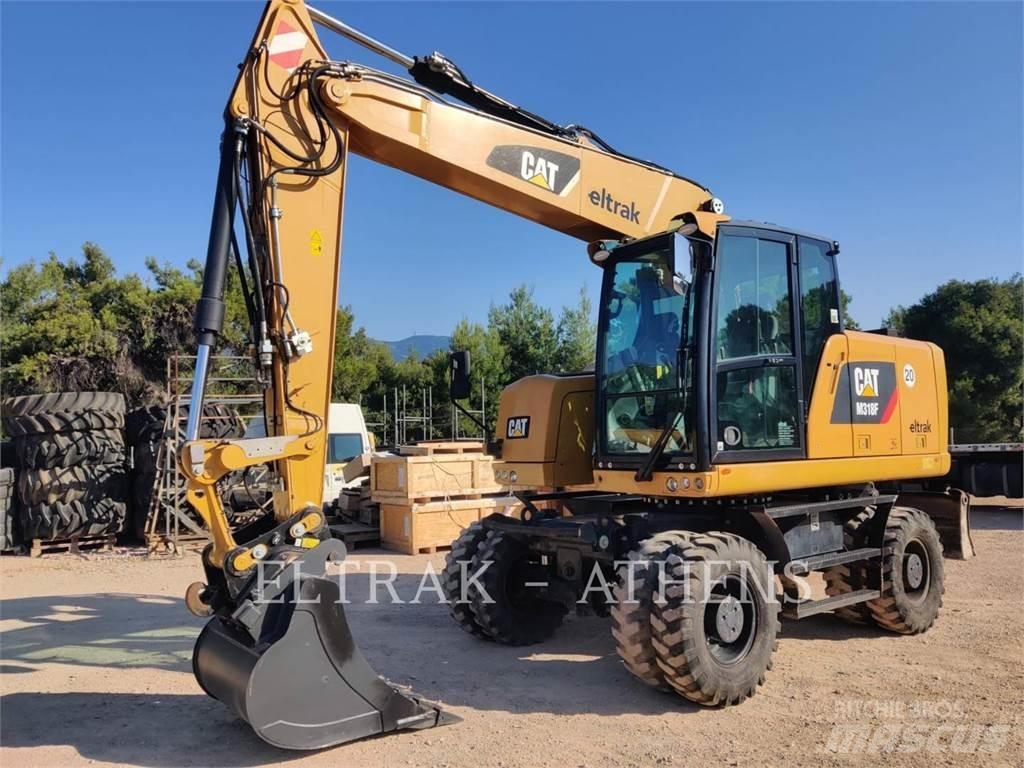 CAT M318F Колісні екскаватори