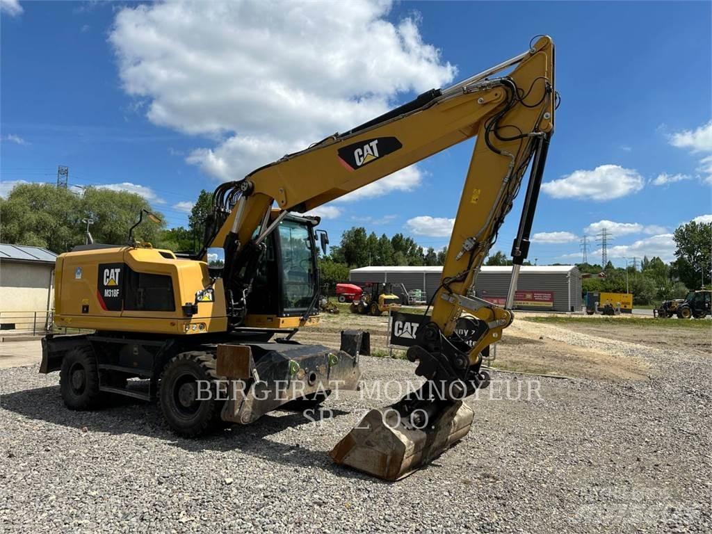 CAT M318F Колісні екскаватори