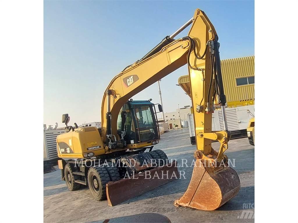 CAT M320D2 Колісні екскаватори