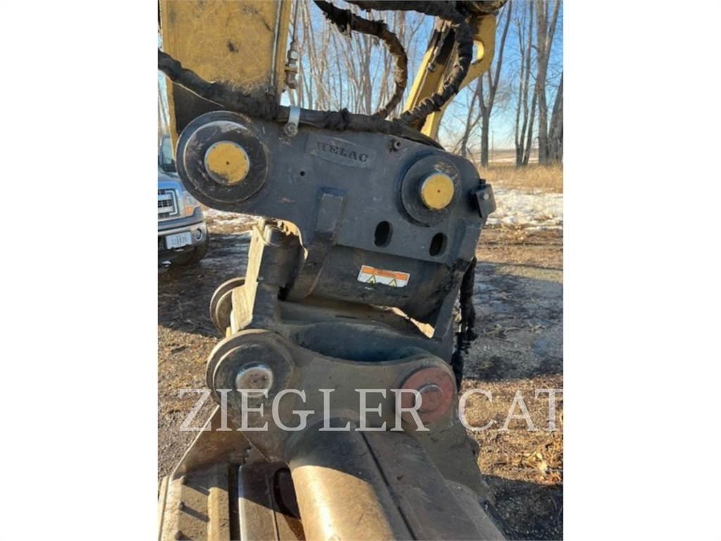 CAT M320F Колісні екскаватори