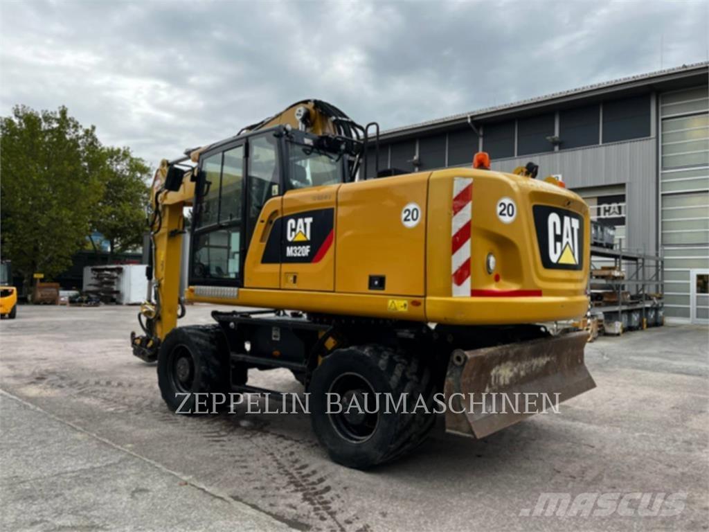 CAT M320F Колісні екскаватори