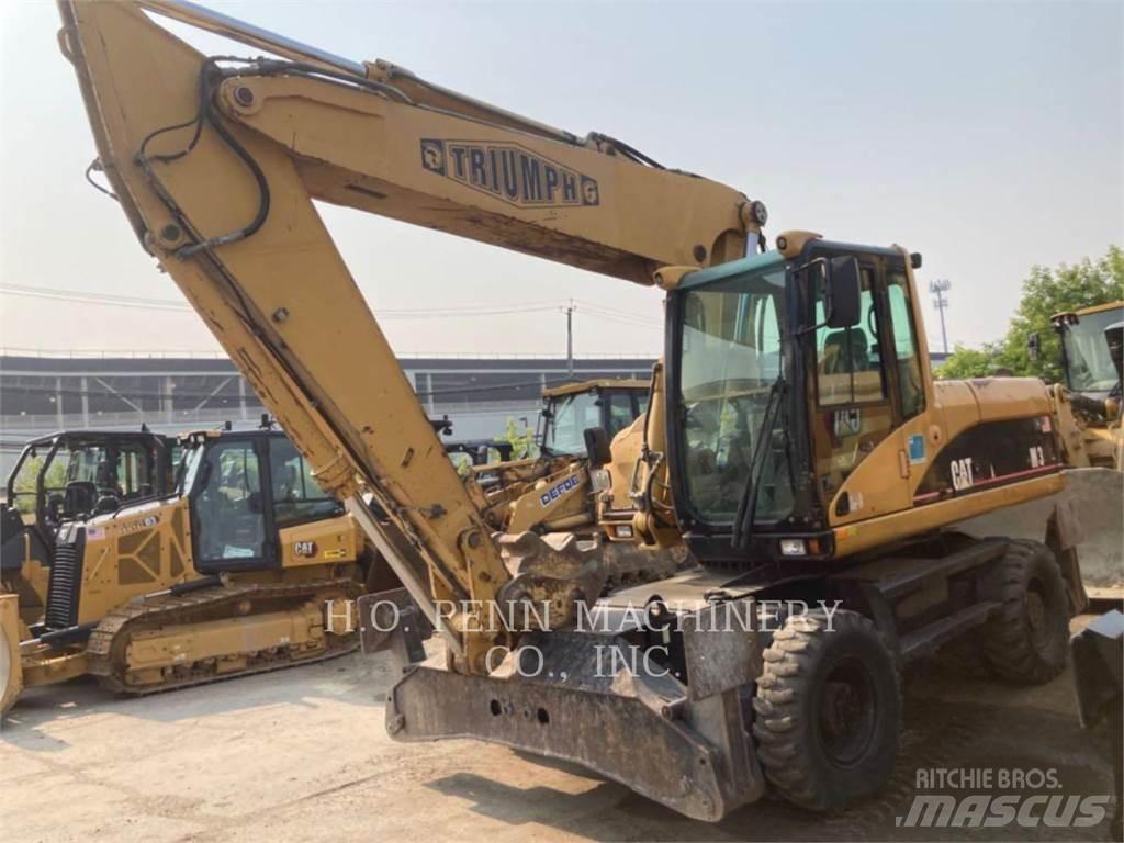 CAT M322C Колісні екскаватори