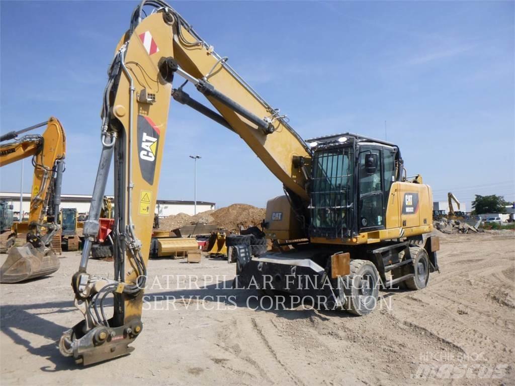CAT MH3022-06 Колісні екскаватори