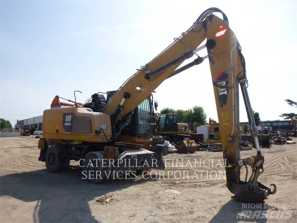 CAT MH3022-06 Колісні екскаватори