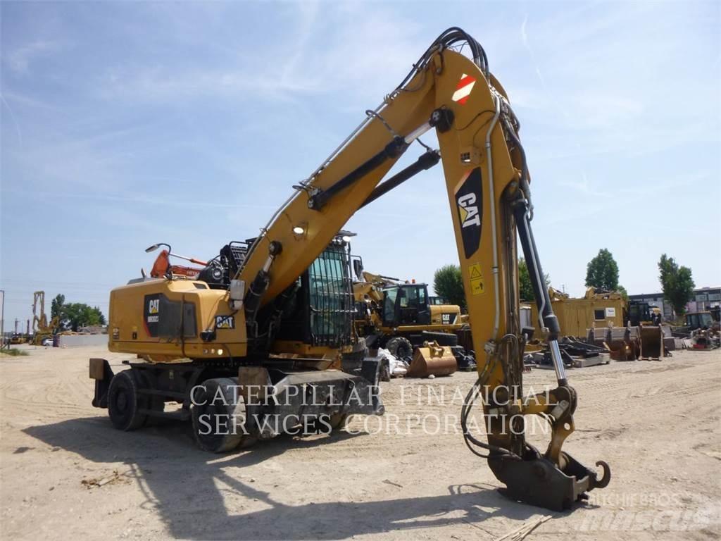 CAT MH3022-06 Колісні екскаватори