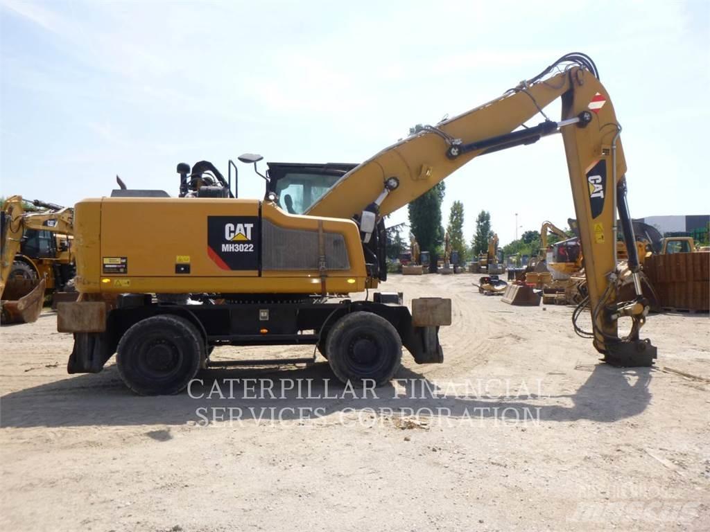 CAT MH3022-06 Колісні екскаватори
