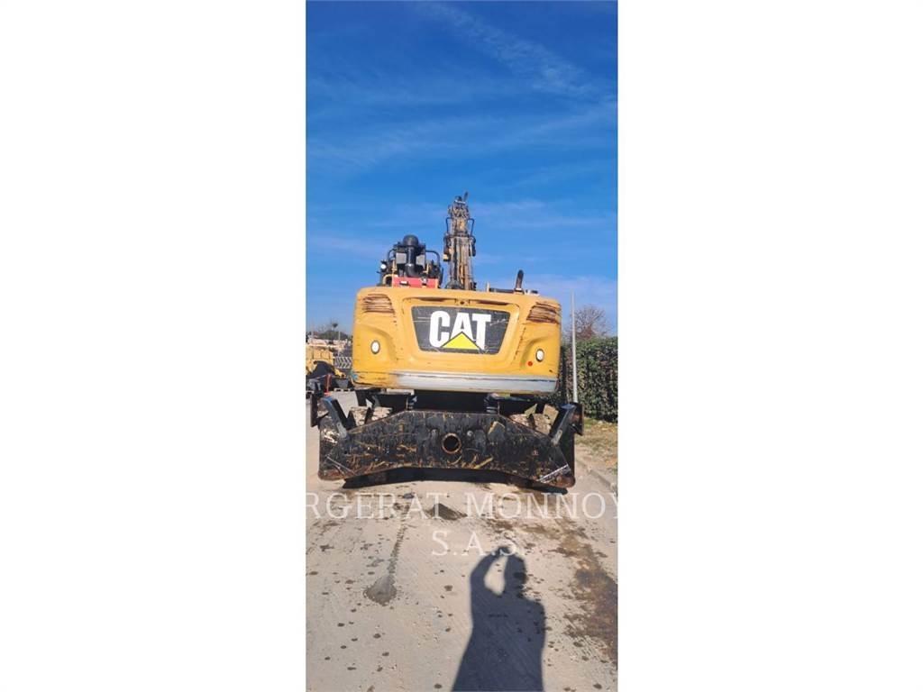 CAT MH3022 IVC Колісні екскаватори