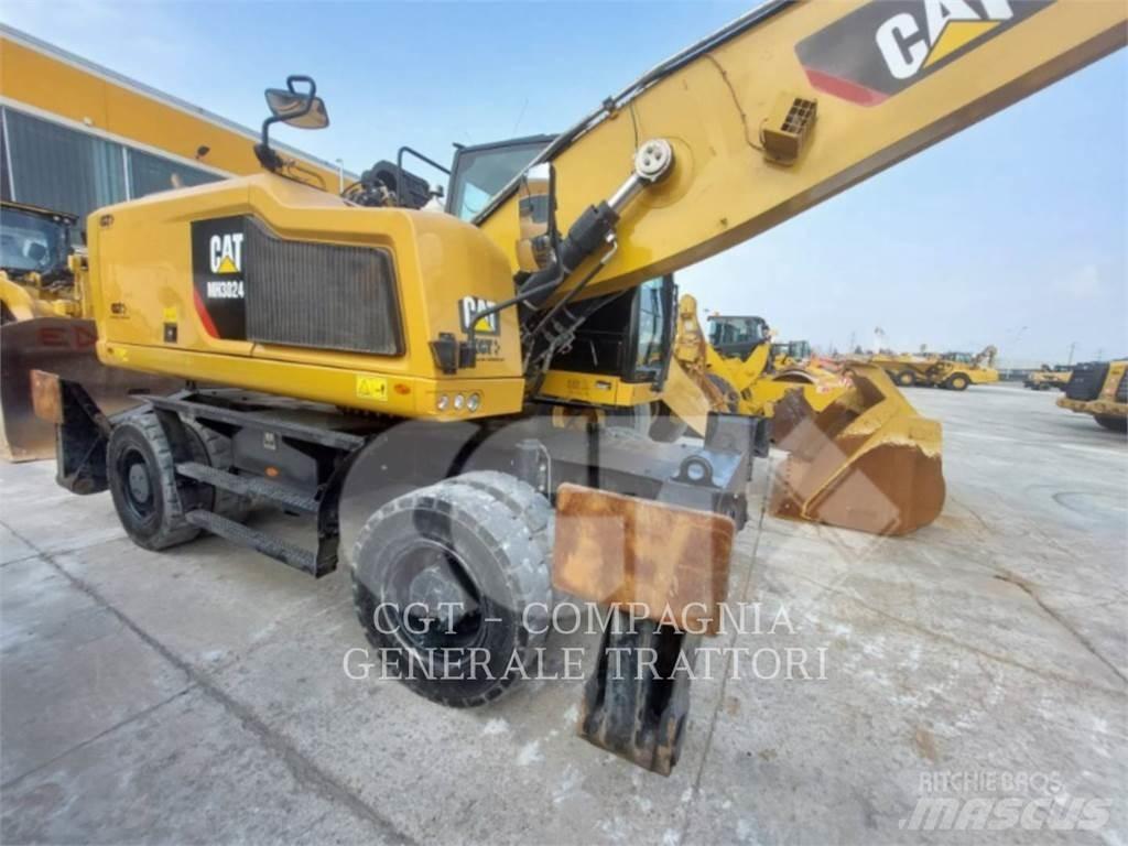 CAT MH3024 Колісні екскаватори