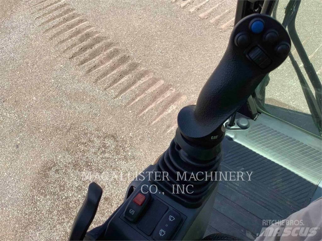 CAT MH3024 Колісні екскаватори