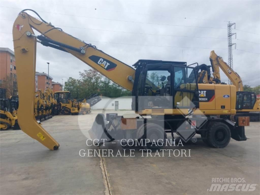 CAT MH3024 Колісні екскаватори