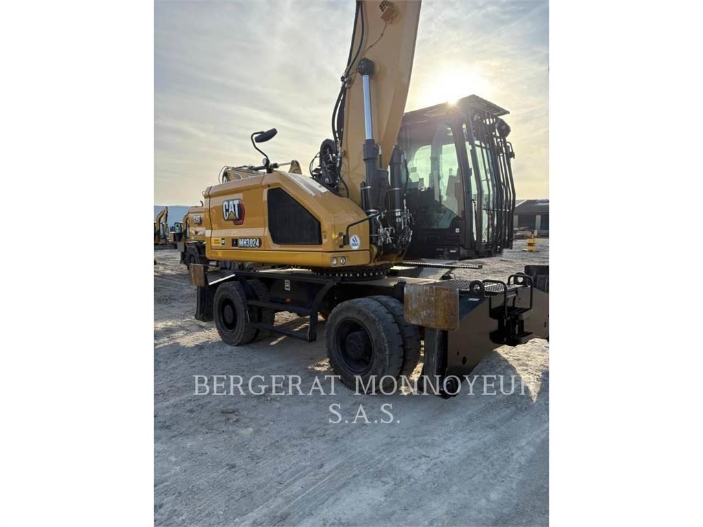 CAT MH3024 Колісні екскаватори