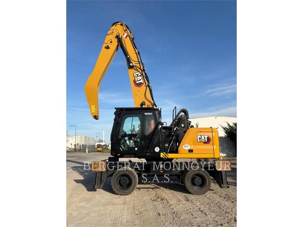 CAT MH3024 Колісні екскаватори