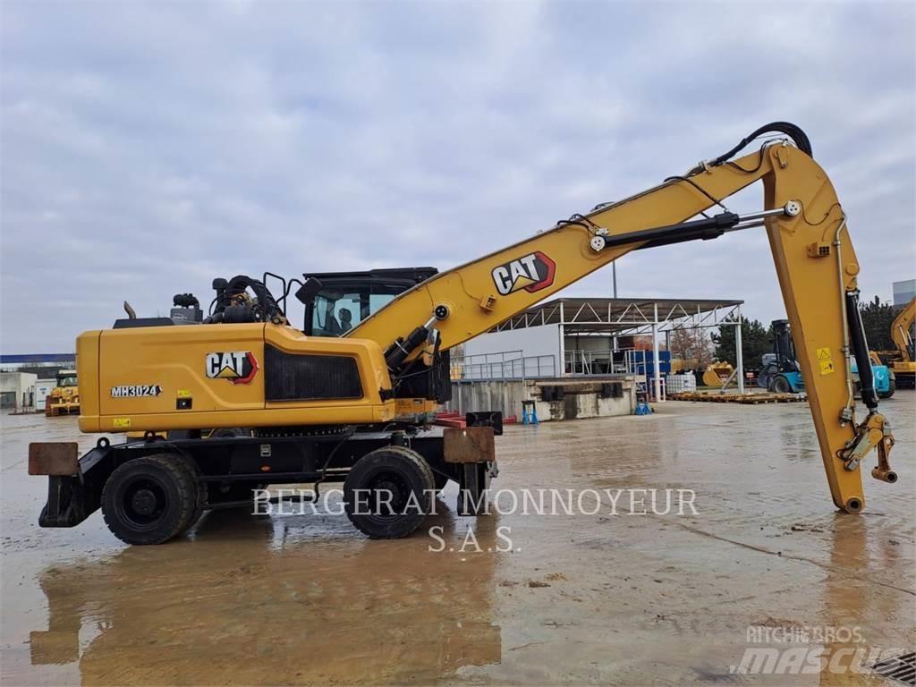 CAT MH3024 Колісні екскаватори