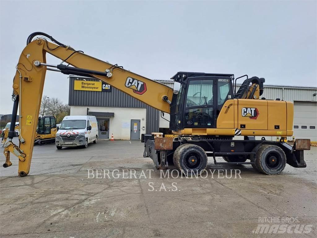 CAT MH3024 Колісні екскаватори