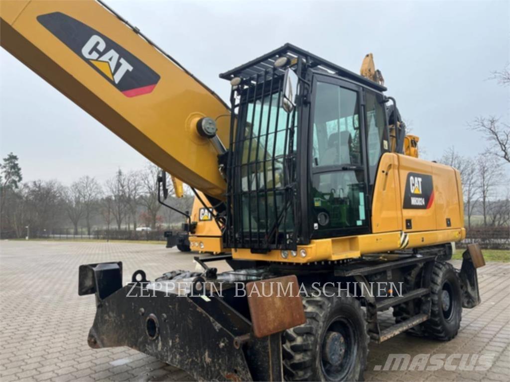 CAT MH3024 Екскаватори для знесення споруд