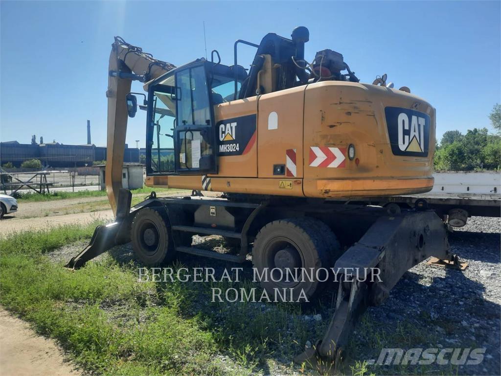 CAT MH3024-06 Колісні екскаватори