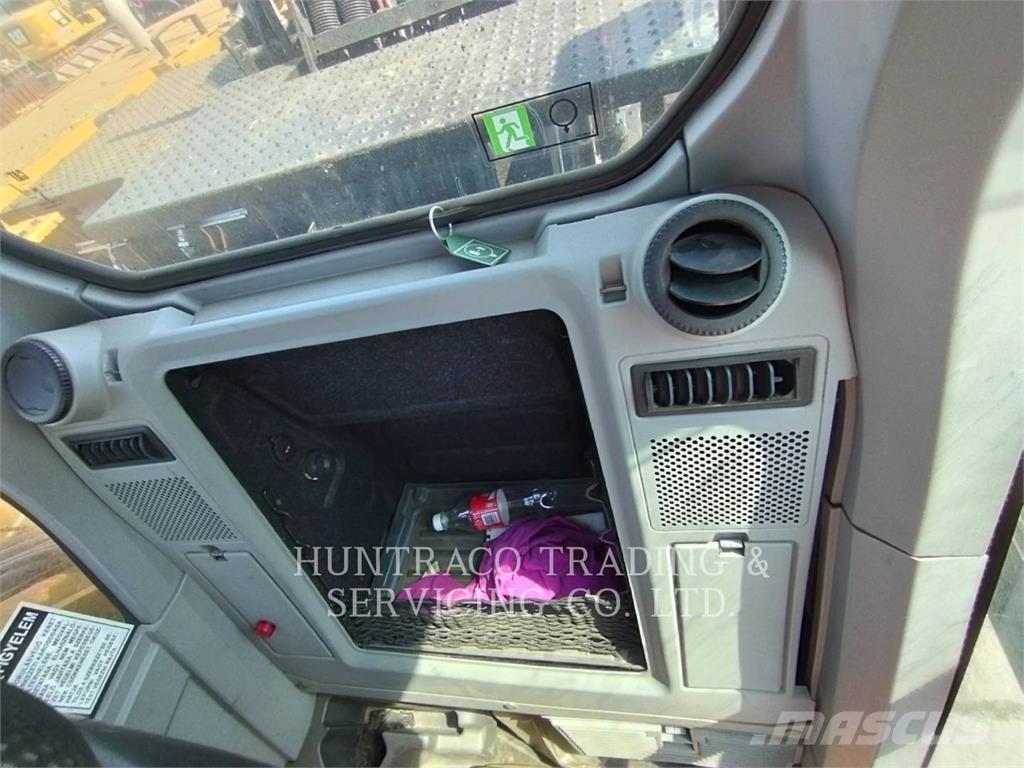 CAT MH3024-07 Колісні екскаватори